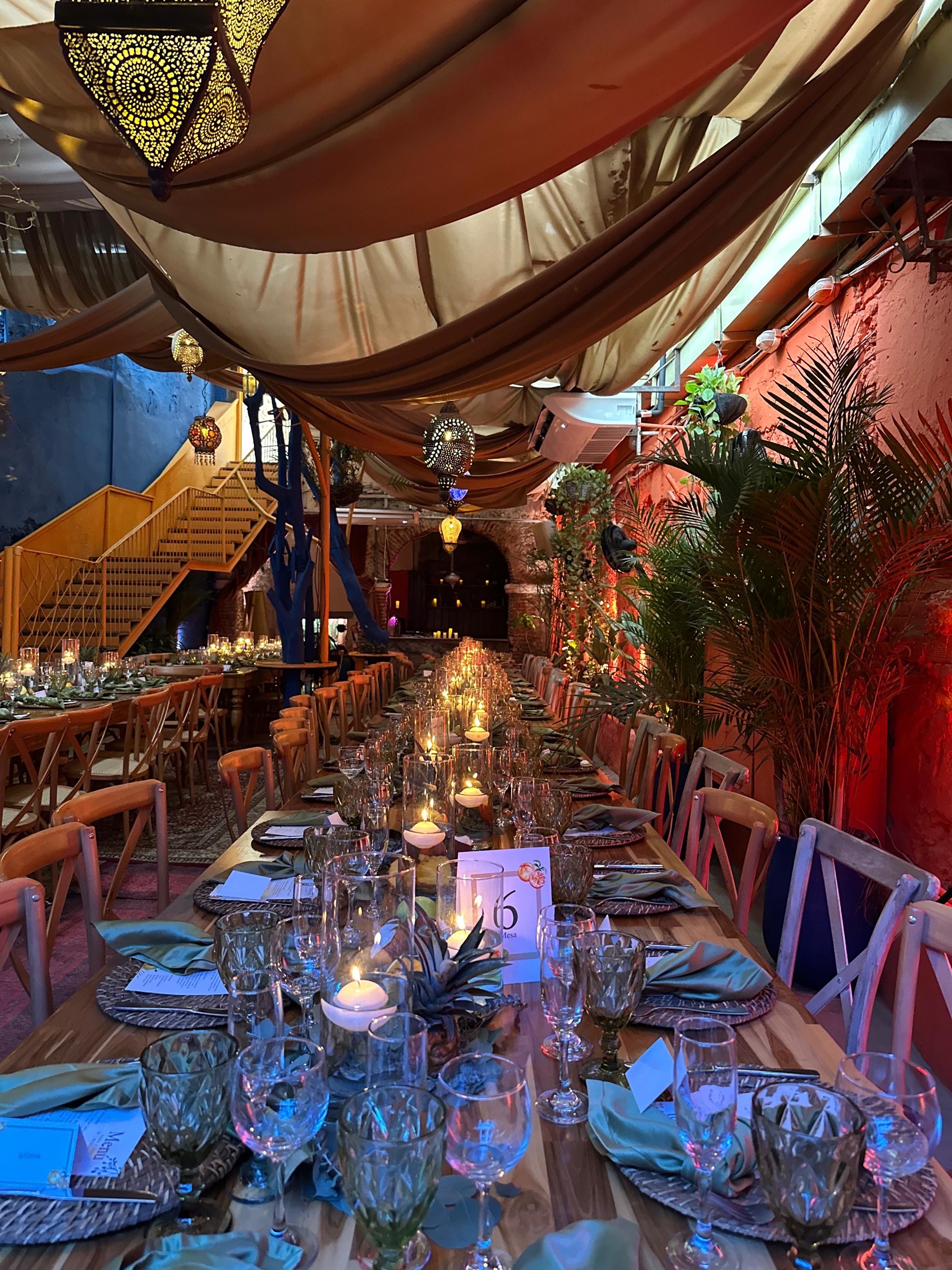 Long banquet table perspective at Casa Bohême