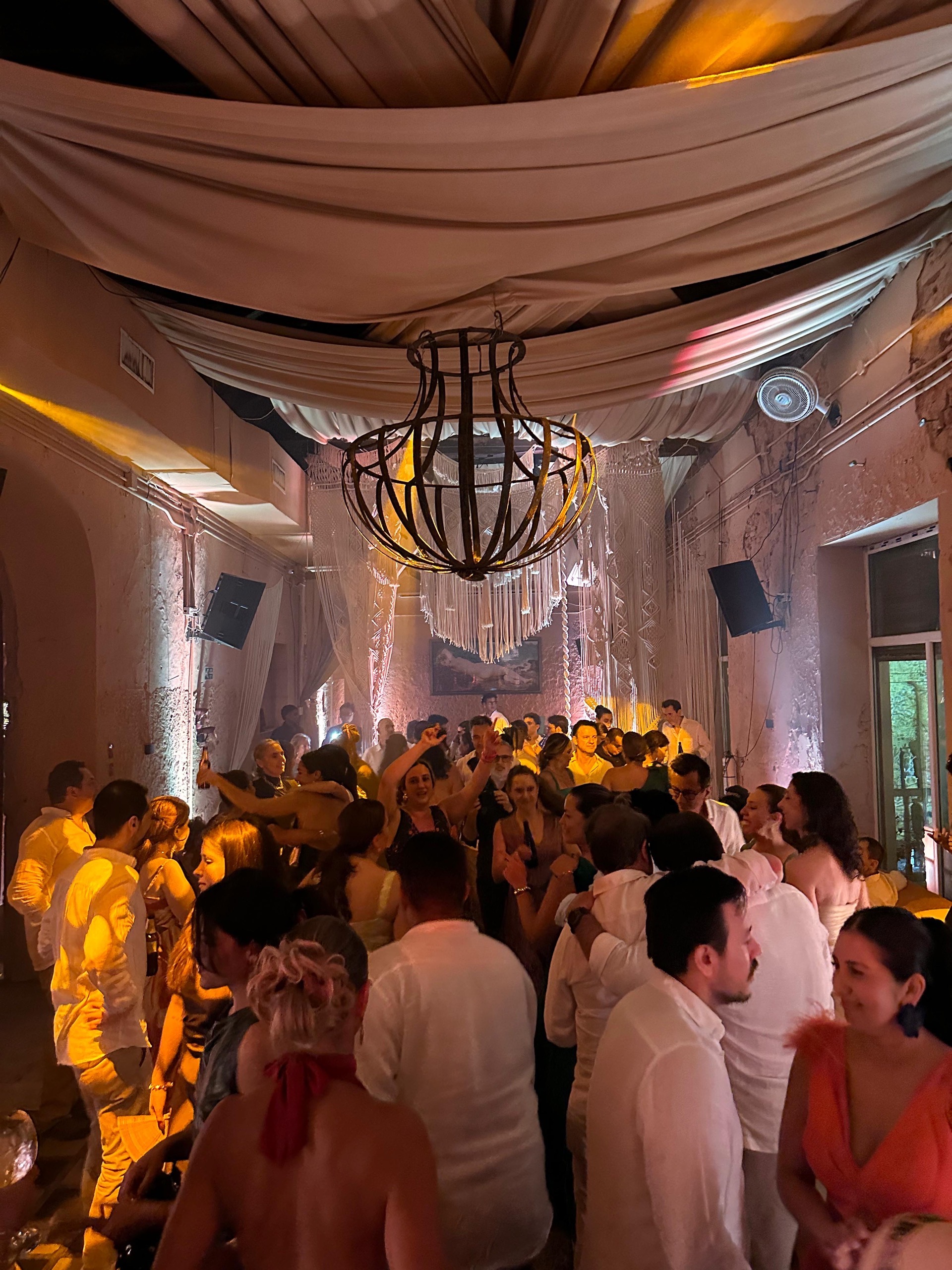 Dance floor with chandelier at Casa Bohême