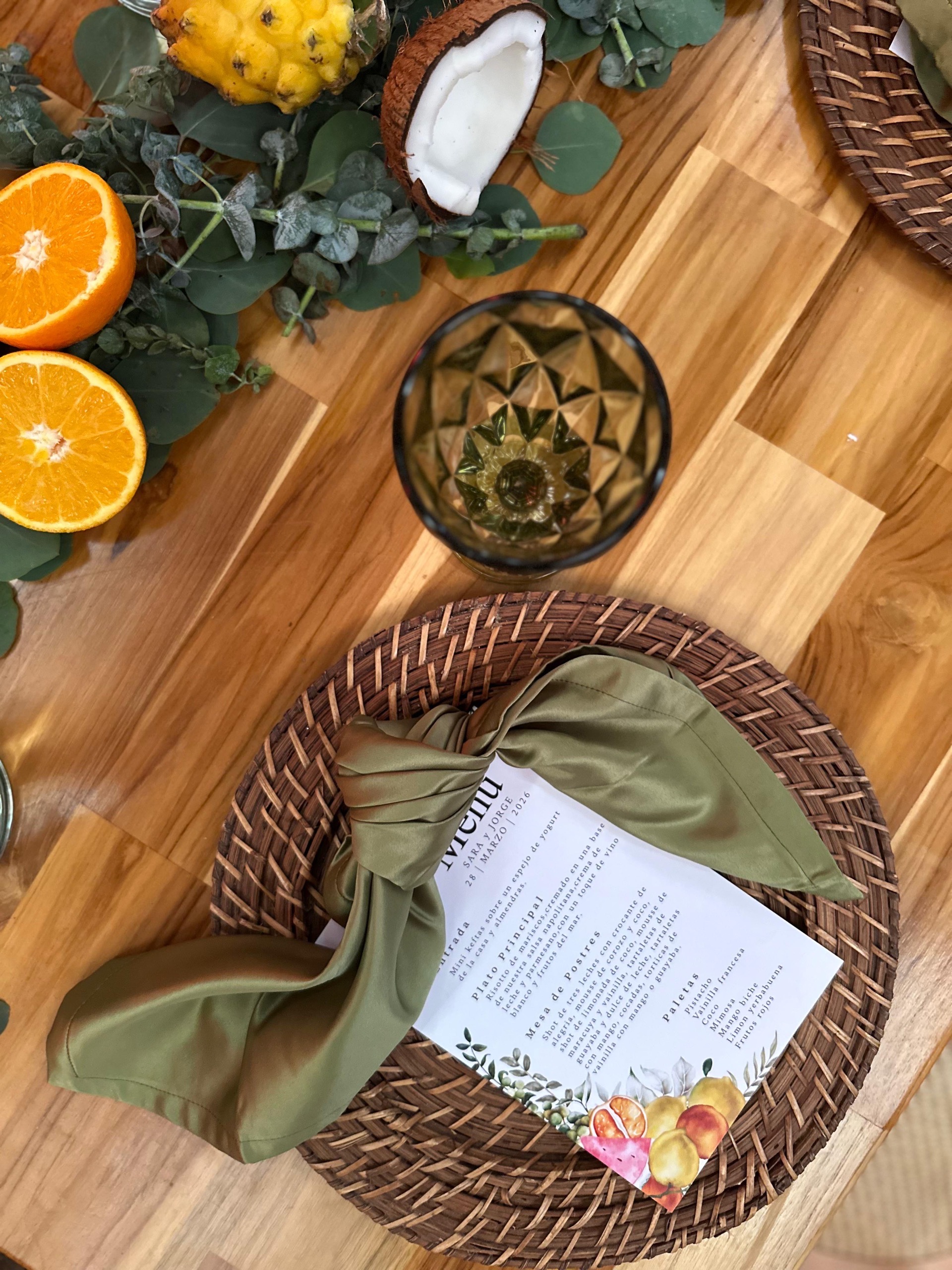 Overhead place setting with tropical fruits